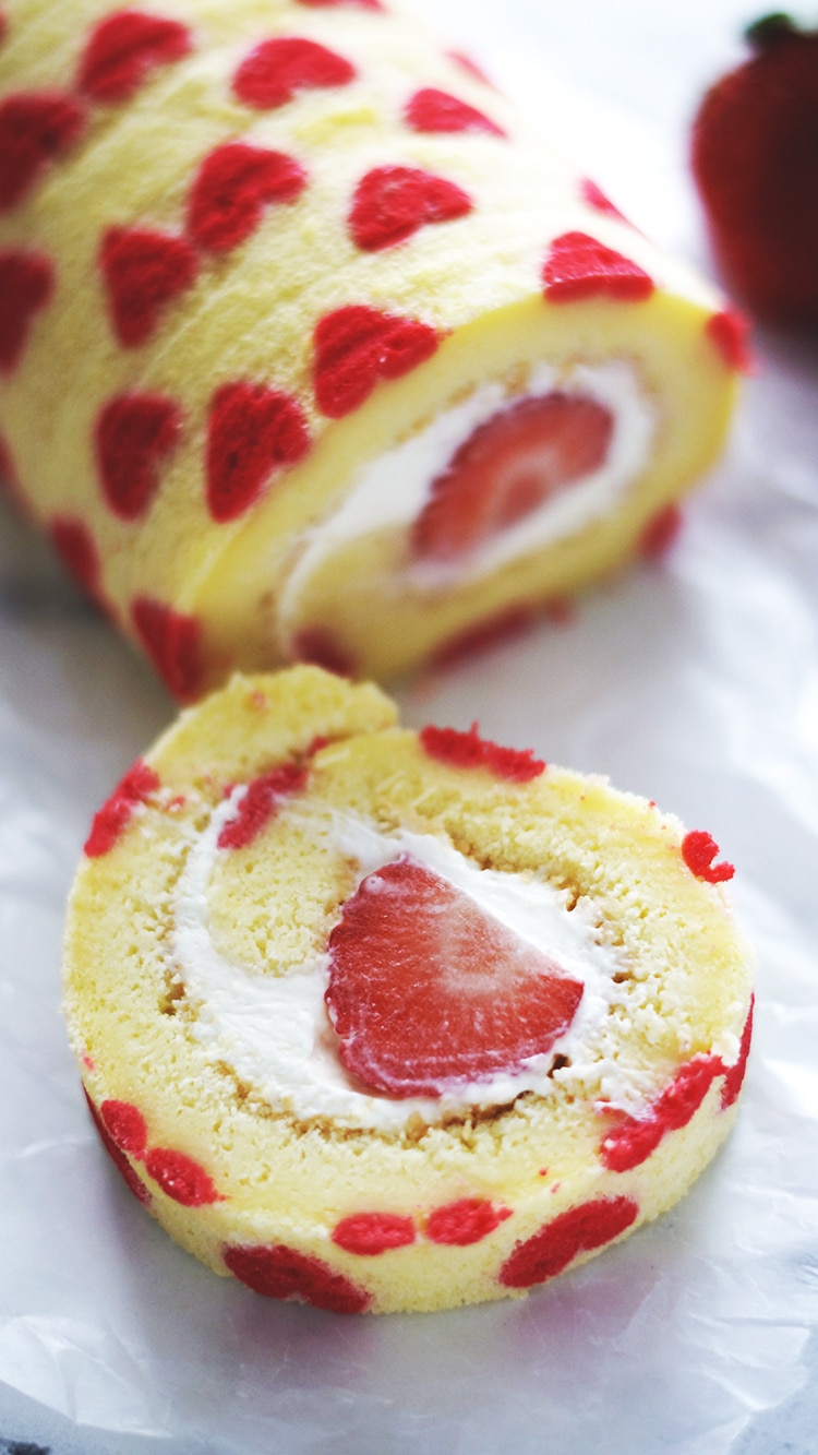 Valentine Strawberry Swiss Roll with Cream Cheese Frosting- These recipe has been tested for your success. Chiffon cake filled with cream cheese frosting and fresh strawberry.Gift this to your love ones this Valentines day.