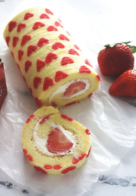 Valentine Strawberry Swiss Roll with Cream Cheese Frosting- Learn how to make delicious swiss roll and impress your friends and love ones / the skinny pot