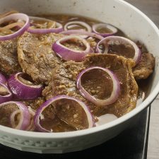 Bistek Tagalog is a Filipino version of beef steak. It has citrus flavor and a mixture of salty and sweet taste. It's a cheap version of beef steak.