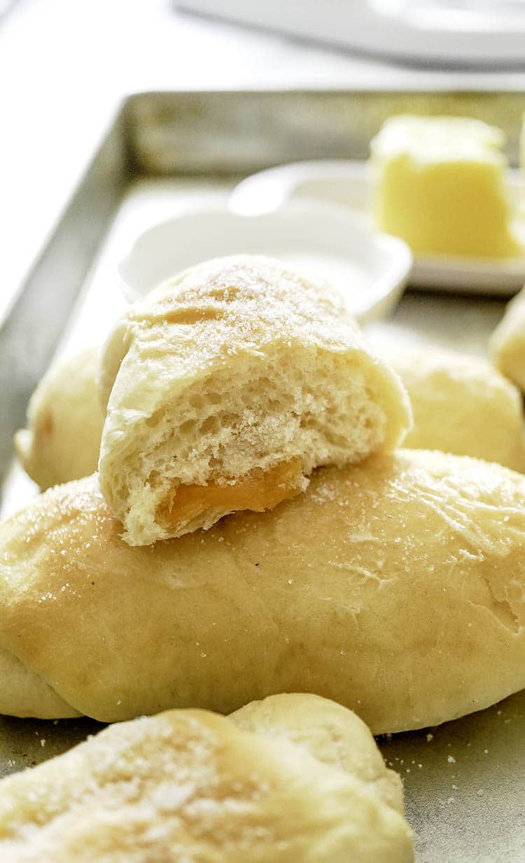 Cheese Bread Recipe Filipino Version. Soft and Fluffy Bread with Butter and Sugar on Top. Perfect for that morning freshly brewed coffee everybody will enjoy!