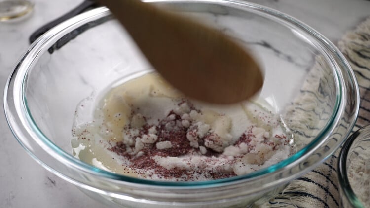Mix Ube powder,sugar and oil in a medium size bowl
