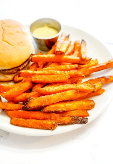 Enjoy these Frozen Sweet Potato Fries cooked in the Air Fryer – impeccably crispy, free from sogginess, swift to prepare, health-conscious, and boasting a noticeably reduced grease factor. Enjoy a snack that effortlessly combines quickness, wholesome goodness, and a satisfying crunch without the excess grease.